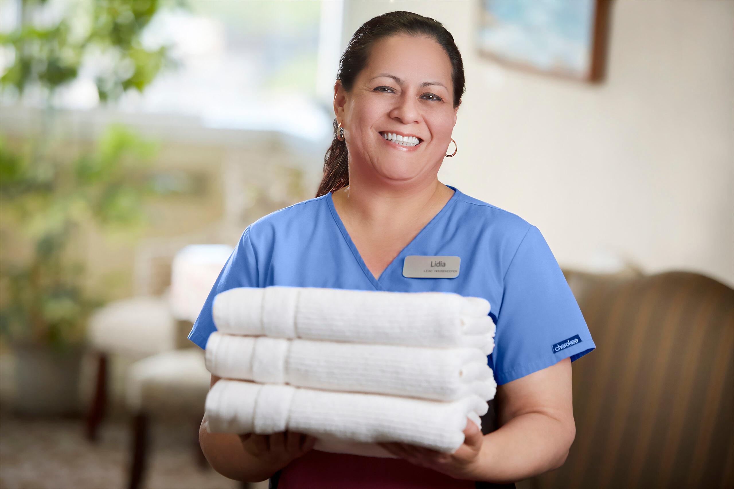 The Neighborhood Staff with Towels